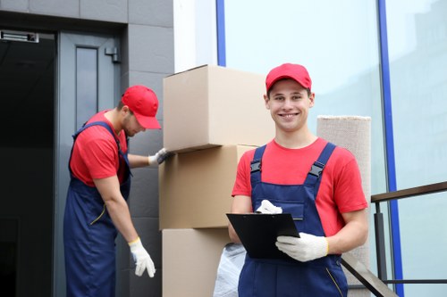 Man with van loading boxes for a UK move