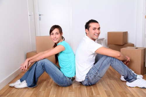 Professional team unloading household items at a new Earlscourt property