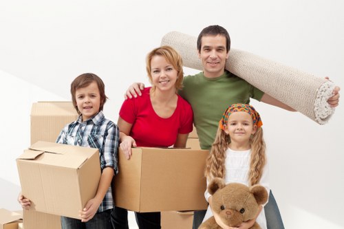 Packed boxes and furniture ready for transport in Earlscourt