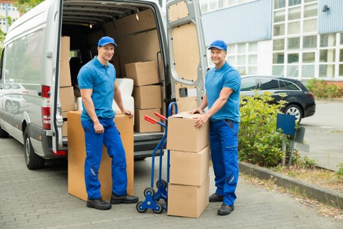 Flat move support in Earlscourt with boxes and household items