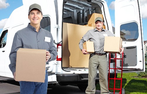 Local moving team loading furniture for an Earlscourt home