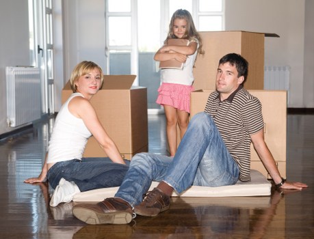 Team handling furniture in a local Earlscourt street
